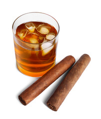 Glass of whiskey and cigars isolated on white