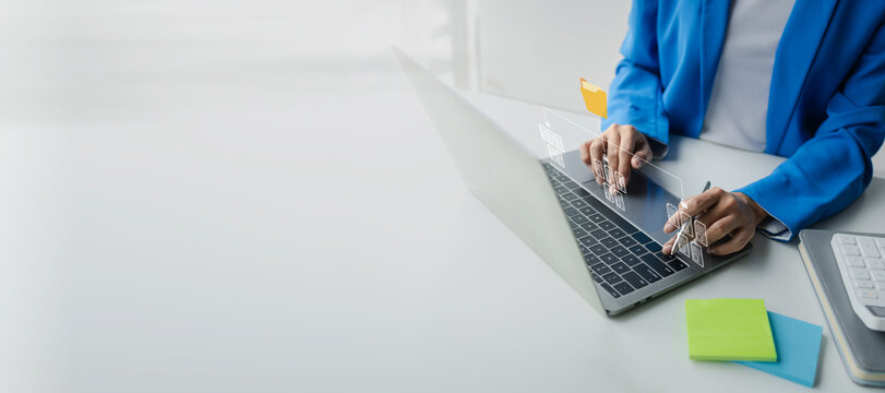 Concept managing data files on a computer, arranging data files in order and uploading files on the internet, storing work files on the cloud so that they can be accessed online, managing work files.