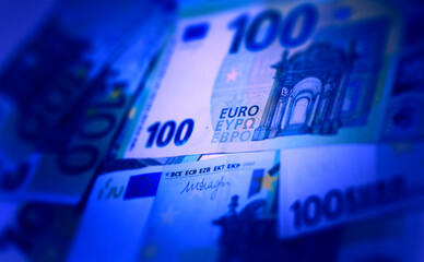 Euro banknotes texture, concept of bank, taxes, income, successful business. 100 euro bills on with...