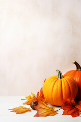 Naklejka na ściany i meble Seasonal Décor: Fall Background Featuring Vibrant Pumpkins and Leaves on a Light Surface