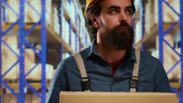 Export manager carrying packages from racks, preparing to ship orders for transportation. Depot employee taking boxes to quality control department, working on shipment and inventory management.