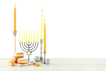 Hanukkah celebration. Composition with menorah, dreidels and gift boxes on wooden table against...