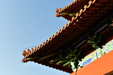 Photo of roof and eaves in traditional Chinese royal architectural style, taken at the famous Ming Xiaoling Mausoleum in Nanjing, Jiangsu Province, China