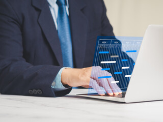 Project manager updates tasks and milestones progress planning on a virtual screen