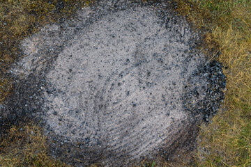 Selected focus photo. Ash and small pieces of coal.