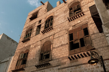 Traditional architecture of old Jeddah town El Balad district houses with wooden windows and balconies Unesco Heritage site in Jeddah Saudi Arabia