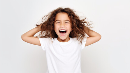 Very happy little child standing on white background