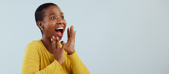 Happy black woman, face and screaming in surprise, winning prize or celebration against a studio...