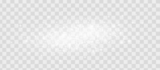 The dust sparks and white stars shine with special light. Vector sparkles on a transparent background. Christmas light effect.
