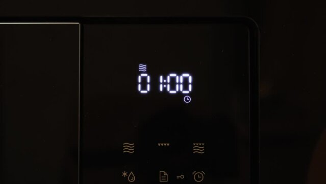Set one minute timer on the microwave display and the countdown close up