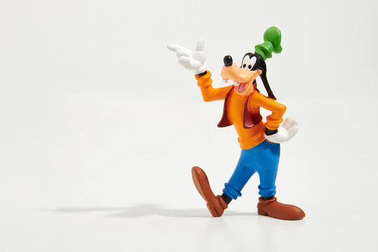 Toy figure of Goofy isolated on white background