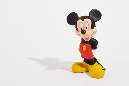 Toy figure of Mickey Mouse isolated on white background