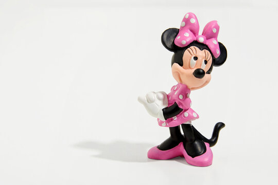 Toy figure of Minnie Mouse isolated on white background