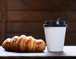 coffee to go in a paper cup