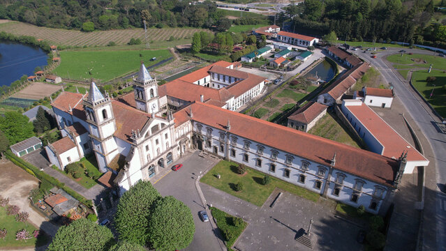 Santo Tirso, Portugal, April 3, 2022:  Aerial view of the Abade Pedrosa Municipal Museum and the Monastery of St. Benedict (Sao Bento) in the city of Santo Tirso, with the Ave River in the background.