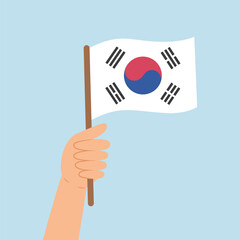 Hand holding a flag of South Korea. Vector illustration in flat style isolated on blue background.