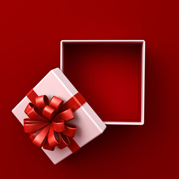 Blank white gift box open or top view of white present box tied with red ribbon bow isolated on dark red background with shadow minimal conceptual 3D rendering