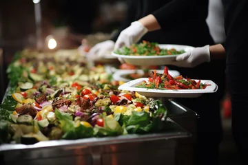Schilderijen op glas People group catering buffet food indoor in restaurant with meat colorful fruits and vegetables © Boraryn
