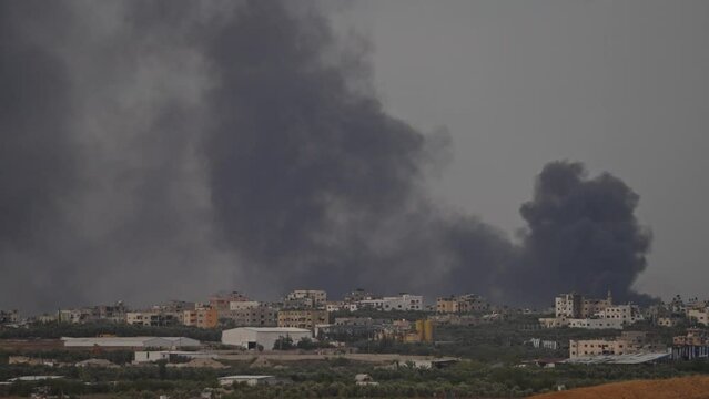 War in Gaza Artillery smoke over the city