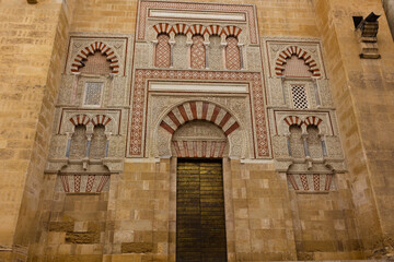 The Puerta de San José (Saint Joseph Door) at the East façade, along Calle del Magistrado...