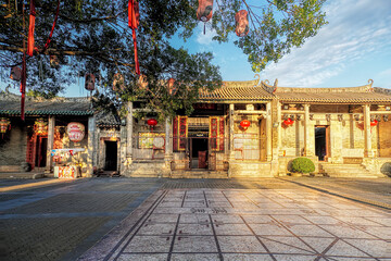 Fototapeta na wymiar Guangzhou city, Guangdong Province, China. Lingnan Impression Garden integrates sightseeing, leisure, entertainment, accommodation and experiencing Lingnan local and folk customs. 