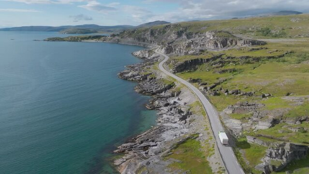 Cargo truck on the road to Havoysund in Northern Norway in summer