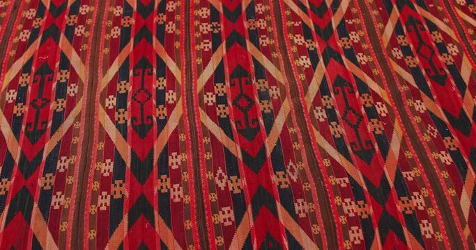 Samarkand carpet is handmade, made according to ancient classical technologies. It is covered with national patterns and ornaments.