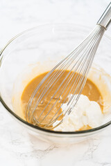 Lemon poppy seed muffins garnished with almond slivers