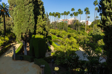 Seville, Spain, September 11, 2021: The Royal Palace of Seville (Real Alcazar). The Jardín del Marqués de la Vega-Inclán (Marquis de la Vega-Inclán Garden).