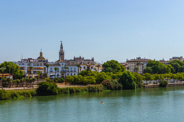 Fototapeta na wymiar View of the waterfront of the Guadalquivir River in Seville, Andalusia, Spain.