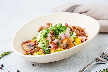 salad with potatoes, rice, meat and green onions side view