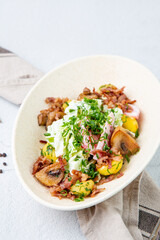 salad with potatoes, rice, meat and green onions top view