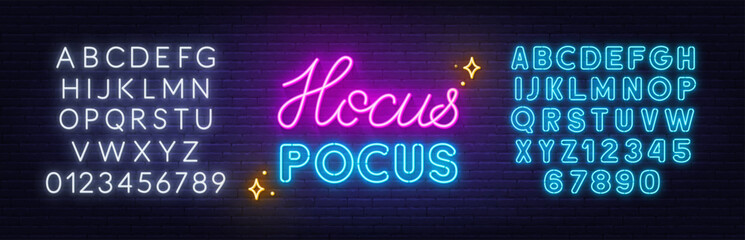 Hocus Pocus  neon lettering on brick wall background