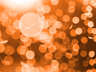 apricot crush abstract circular background with bokeh defocused blurred lights