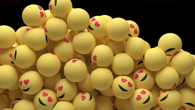 Editorial footage: Animation of falling and filling screen yellow balls with happy love emotion of emoji at black background. 4K animation