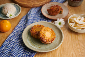 Chinese moon cakes with lotus seed paste filling cooked for mid-autumn festival