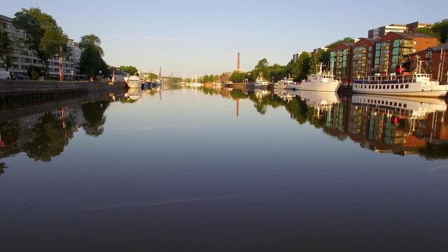 Drone View of Turku City at Sunrise, Capturing the Beauty of the Aura River and the City's Awakening in the Early Morning