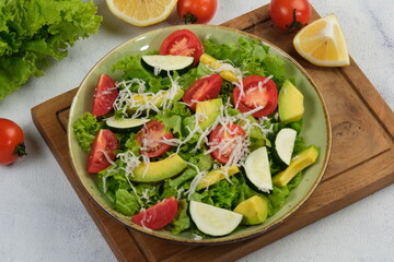 Healthy vegetable salad with tomato,avocado and fresh mix vegetables