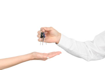 A man gives the keys to a girl isolated on white studio background, the real estate mockup concept.