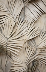 palm leaves and stems on a wall, with a grey ground,