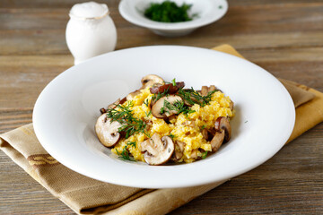 Tasty soft polenta with mushrooms healthy food