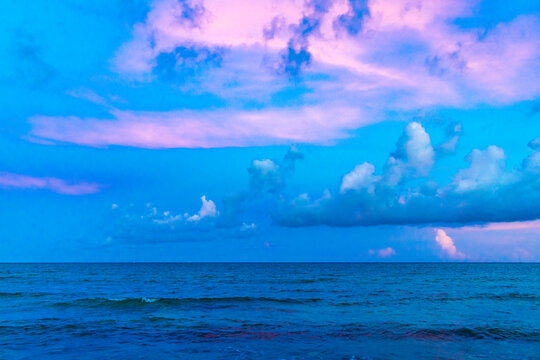 Awesome sunset at tropical Caribbean beach Playa del Carmen Mexico. © arkadijschell
