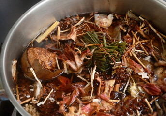 Nearly finished boiling the Chinese herbal juice for internal body heat or internal hot relief....
