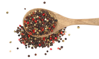 Colorful pepper in wooden spoon isolated on white, top view