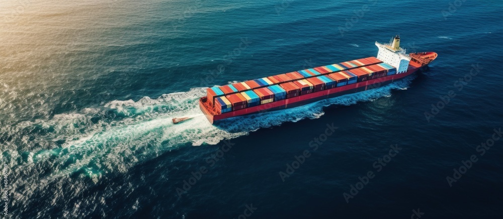 Poster bird s eye view of cargo ship with shipping container at sea copy space image