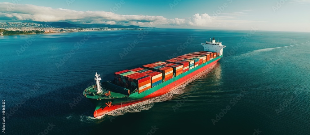 Poster bird s eye view of cargo ship with shipping container at sea copy space image
