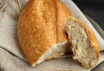 homemade wholemeal tartine bread on a wooden board