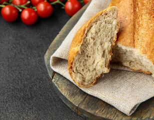 homemade wholemeal tartine bread on a wooden board