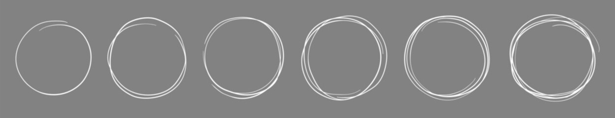 Fototapeta premium Set of hand drawn sketchy circular scribble circles , pencil or pen handwritten. Collection of isolated doodle design elements for logo, sign, emblem, frame, border. Abstract vector illustration.