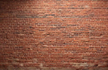 Old red brick wall background, wide panorama of masonry.